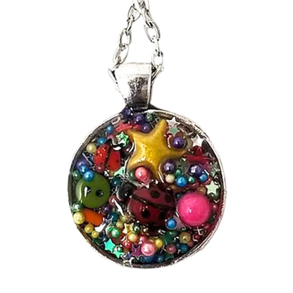 Resin pendant containing variety of unique found objects - chain included - Curio Memento