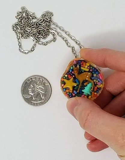 Deer and seashell pendant created using tiny plastic deer, candy sprinkles, sequins and glittered resin - Includes chain - Curio Memento