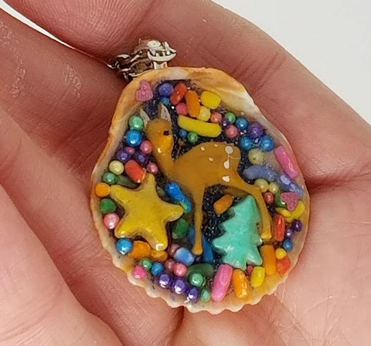 Deer and seashell pendant created using tiny plastic deer, candy sprinkles, sequins and glittered resin - Includes chain - Curio Memento