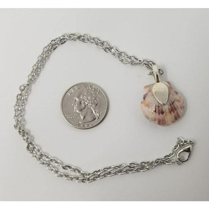 Seashell pendant created using antique miniature angel, candy sprinkles, sequins and resin. Includes 18" chain - Curio Memento