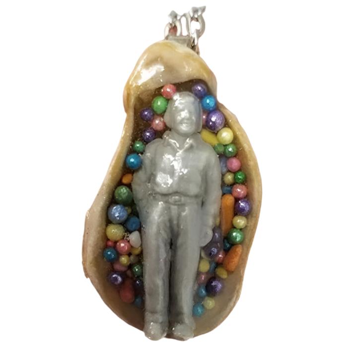 Seashell pendant with miniature human figure and candy sprinkles in layered resin // Includes 18" chain - Curio Memento