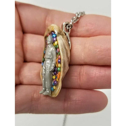 Seashell pendant with miniature human figure and candy sprinkles in layered resin // Includes 18" chain - Curio Memento